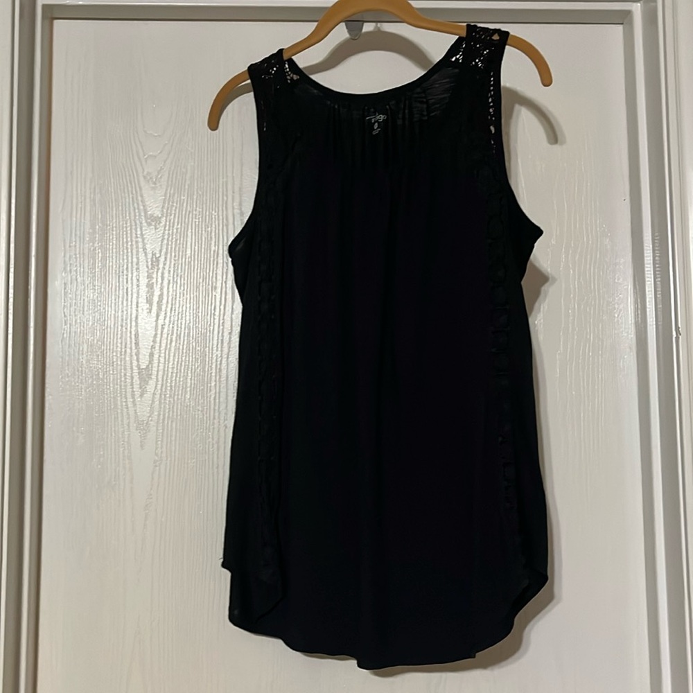 Black sleeveless top with crochet details